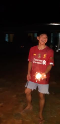 Chaiwat just enjoying burning his sparklers.